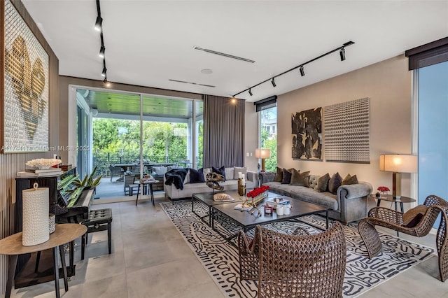 285 W Mashta Dr, Key Biscayne, FL 33149 - living area with rail lighting and concrete flooring