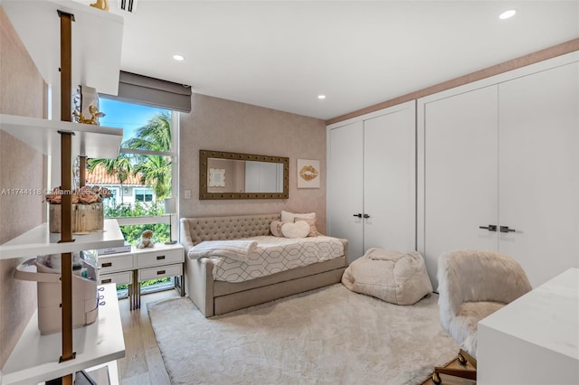 285 W Mashta Dr, Key Biscayne, FL 33149 - bedroom featuring two closets, wood finished floors, and recessed lighting