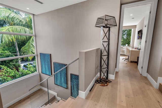 285 W Mashta Dr, Key Biscayne, FL 33149 - hallway featuring an upstairs landing, hardwood / wood-style flooring, and baseboards