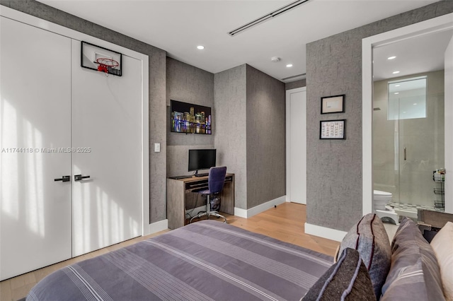 285 W Mashta Dr, Key Biscayne, FL 33149 - bedroom featuring light wood-type flooring, a desk, recessed lighting, and connected bathroom