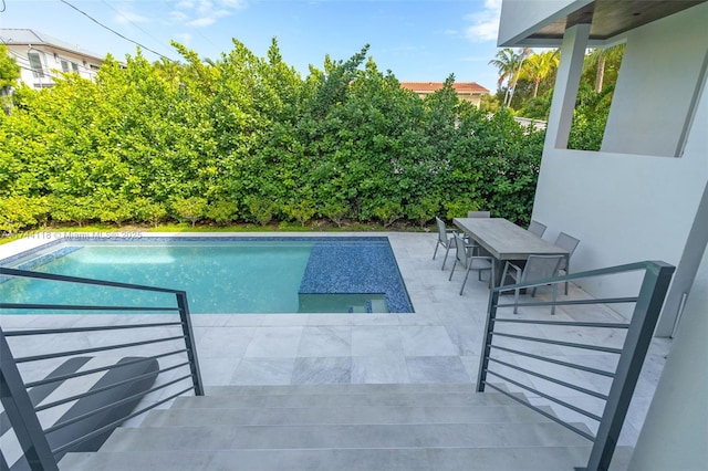 285 W Mashta Dr, Key Biscayne, FL 33149 - swimming pool featuring outdoor dining space and a patio