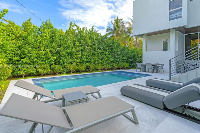 285 W Mashta Dr, Key Biscayne, FL 33149 - swimming pool with a patio area and outdoor lounge area