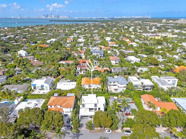 285 W Mashta Dr, Key Biscayne, FL 33149 - aerial view of residential area featuring a nearby body of water and city skyline