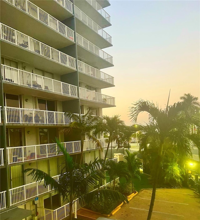 view of outdoor building at dusk