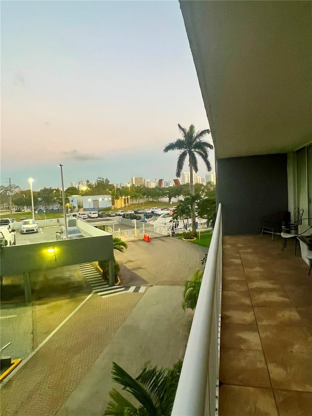 view of balcony at dusk