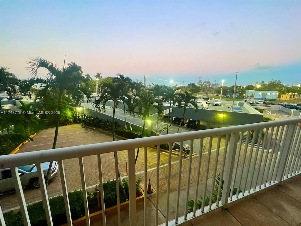 view of balcony at dusk