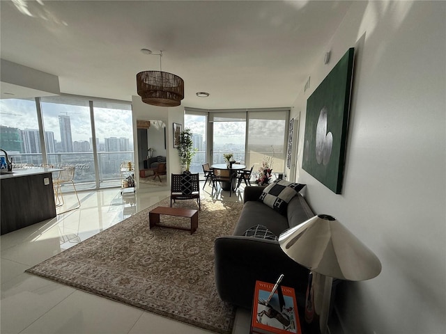 living area with a view of city and expansive windows