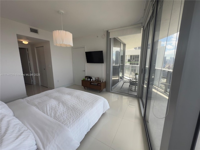 bedroom featuring access to exterior, visible vents, a wall of windows, and light tile patterned flooring