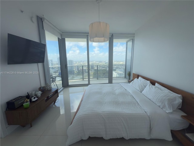 tiled bedroom with expansive windows