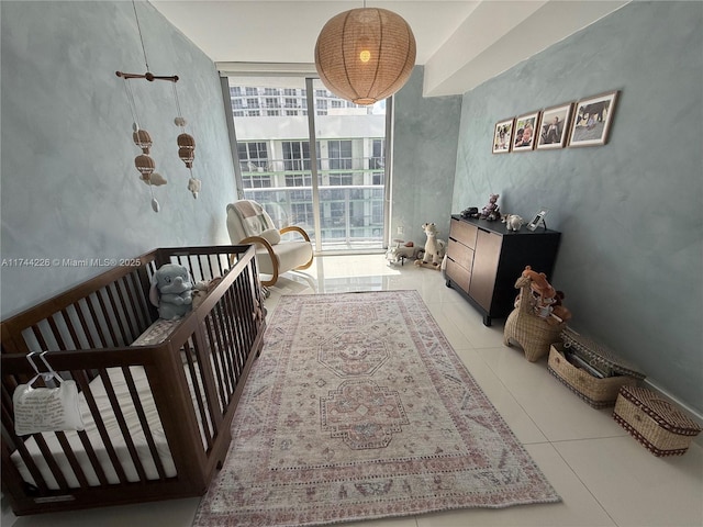 bedroom featuring floor to ceiling windows