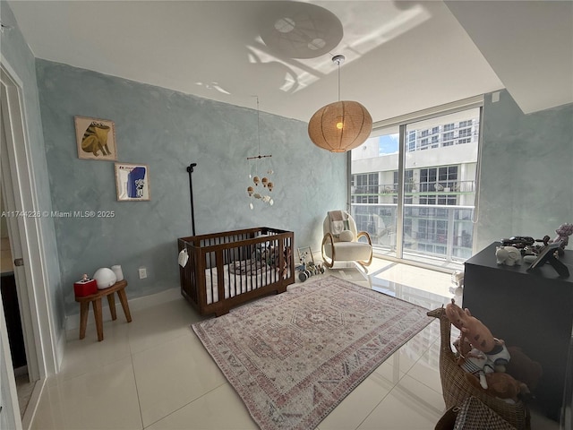 bedroom with tile patterned floors