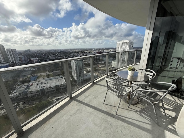 balcony featuring a view of city