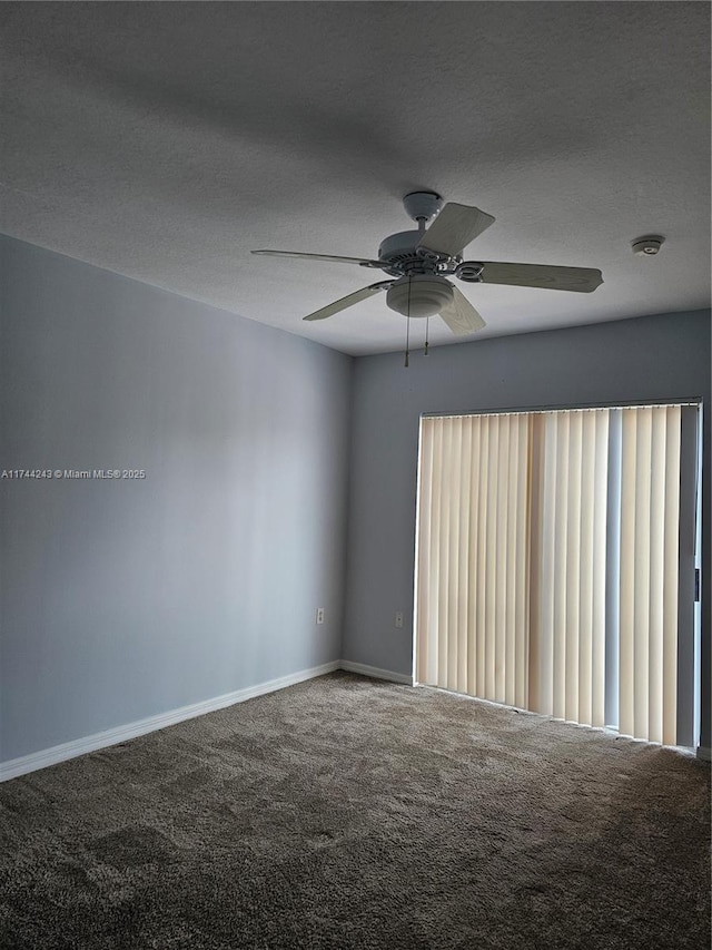 unfurnished room with ceiling fan, carpet flooring, a wealth of natural light, and a textured ceiling