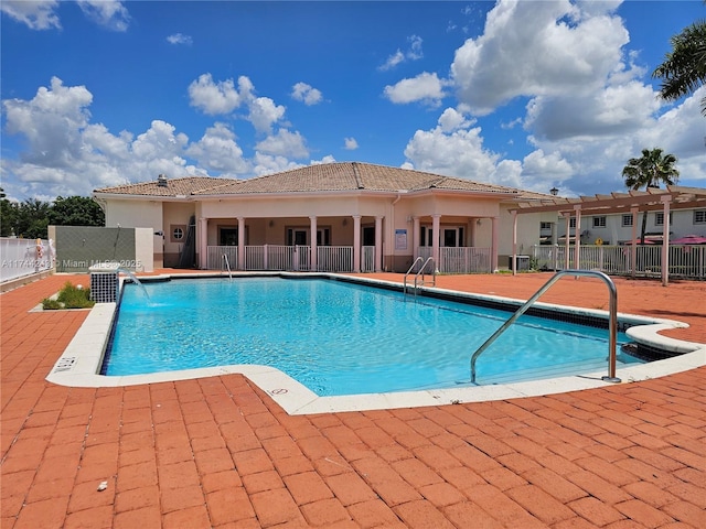 view of pool featuring a patio