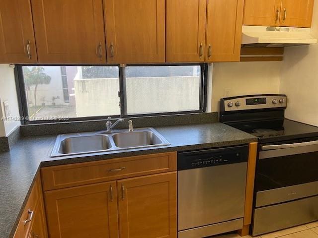 kitchen with sink and appliances with stainless steel finishes