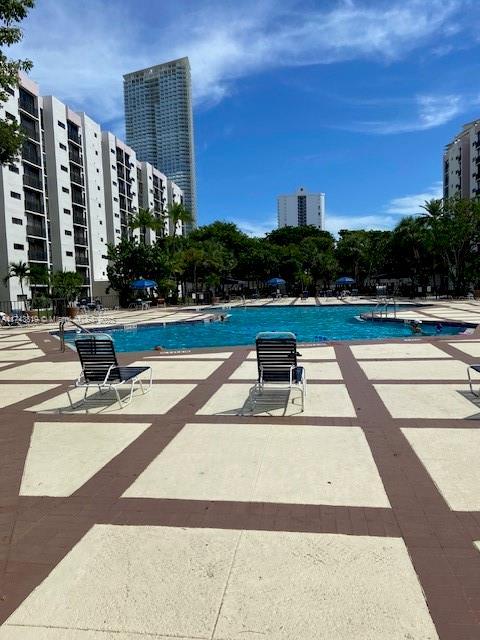 view of swimming pool featuring a patio area