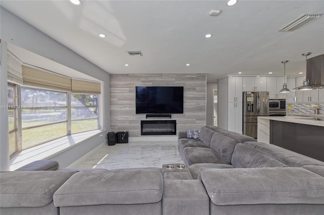 living room with a large fireplace