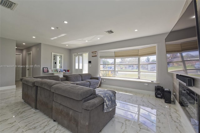 161 NW 46th Ter, Plantation, FL 33317 - living area featuring recessed lighting, visible vents, baseboards, and marble finish floor