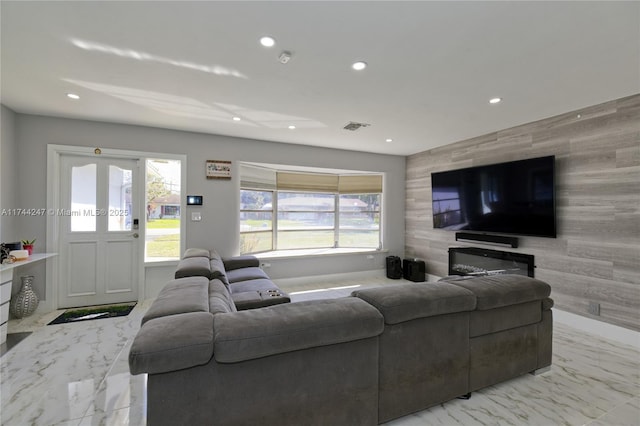 161 NW 46th Ter, Plantation, FL 33317 - living room featuring an accent wall, visible vents, recessed lighting, and marble finish floor