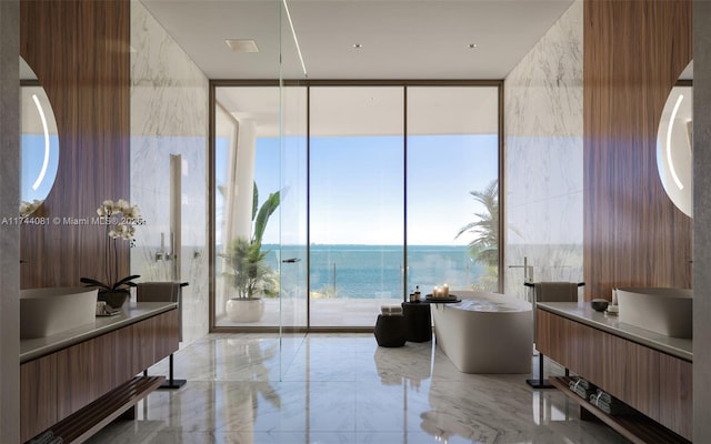 bathroom with a water view