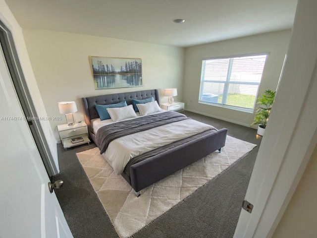 bedroom with light carpet