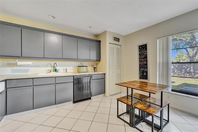 9007 Vineyard Lake Dr Unit 9007, Plantation, FL 33324 - kitchen featuring dishwasher, sink, gray cabinetry, and light tile patterned flooring