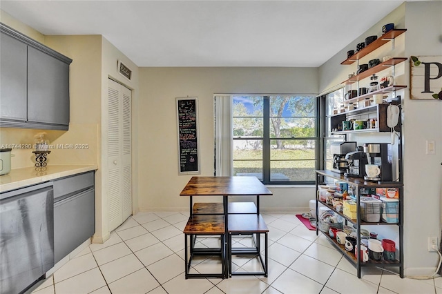 9007 Vineyard Lake Dr Unit 9007, Plantation, FL 33324 - kitchen featuring gray cabinetry, light tile patterned floors, and fridge