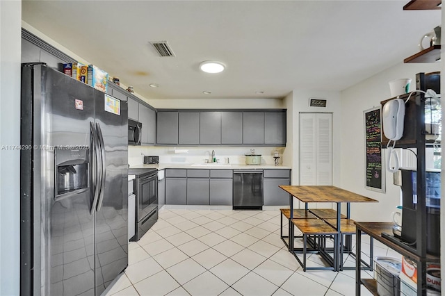 9007 Vineyard Lake Dr Unit 9007, Plantation, FL 33324 - kitchen featuring light tile patterned flooring, appliances with stainless steel finishes, sink, and gray cabinetry