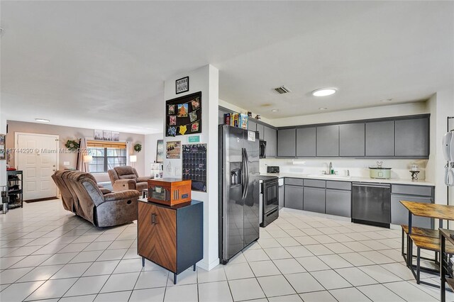 9007 Vineyard Lake Dr Unit 9007, Plantation, FL 33324 - kitchen with sink, gray cabinets, light tile patterned flooring, and appliances with stainless steel finishes