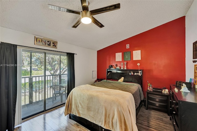 9007 Vineyard Lake Dr Unit 9007, Plantation, FL 33324 - bedroom with lofted ceiling, a textured ceiling, wood-type flooring, and access to outside