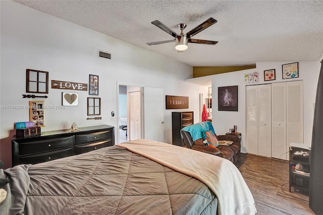 9007 Vineyard Lake Dr Unit 9007, Plantation, FL 33324 - bedroom with vaulted ceiling, hardwood / wood-style floors, ceiling fan, a textured ceiling, and a closet