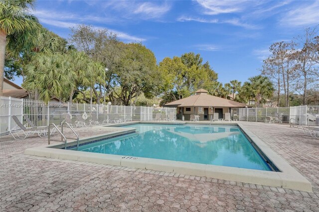 9007 Vineyard Lake Dr Unit 9007, Plantation, FL 33324 - view of swimming pool with a patio