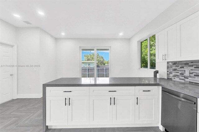 empty room with light parquet floors and ceiling fan