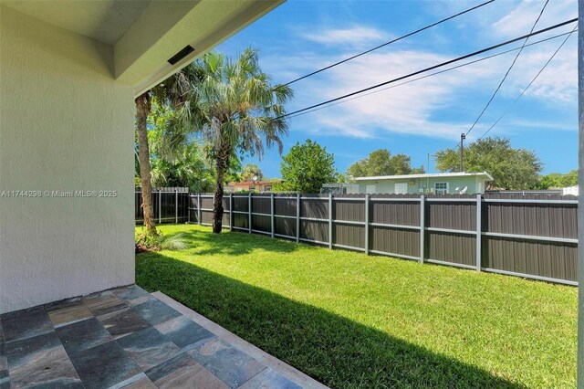 view of yard with a patio area