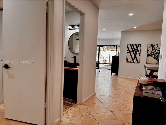 109 Heatherbrook Way Unit 146, Hollywood, FL 33021 - corridor featuring recessed lighting, baseboards, and light tile patterned flooring