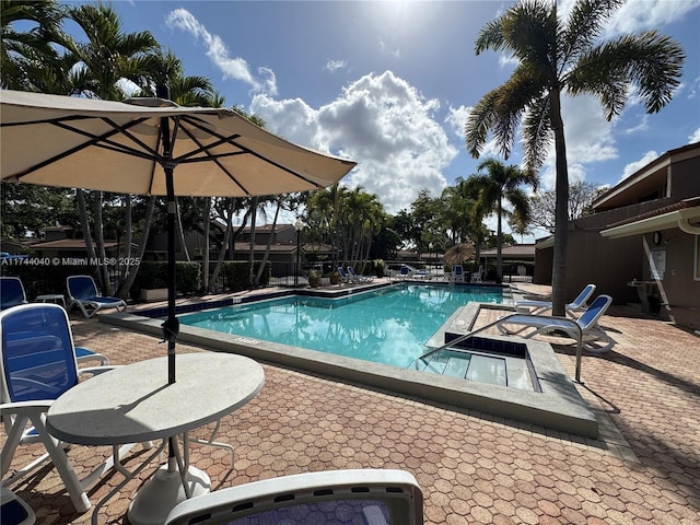 109 Heatherbrook Way Unit 146, Hollywood, FL 33021 - community pool with fence and a patio area