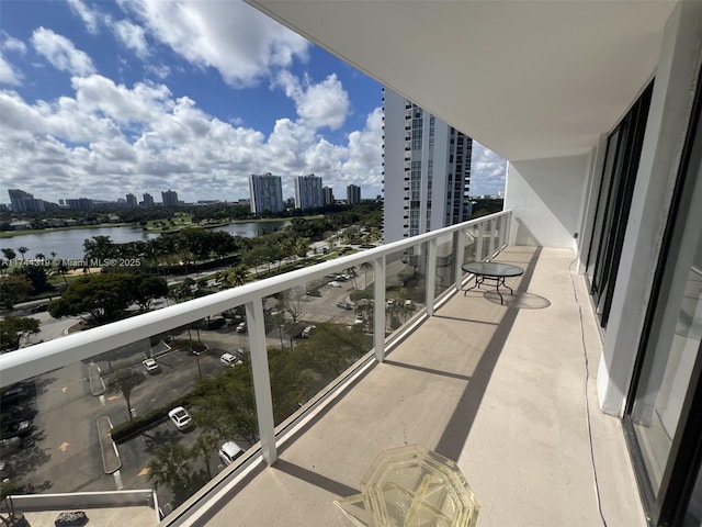 balcony featuring a water view