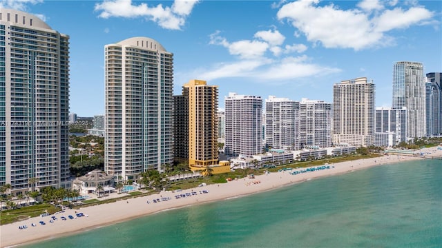 drone / aerial view with a view of the beach and a water view