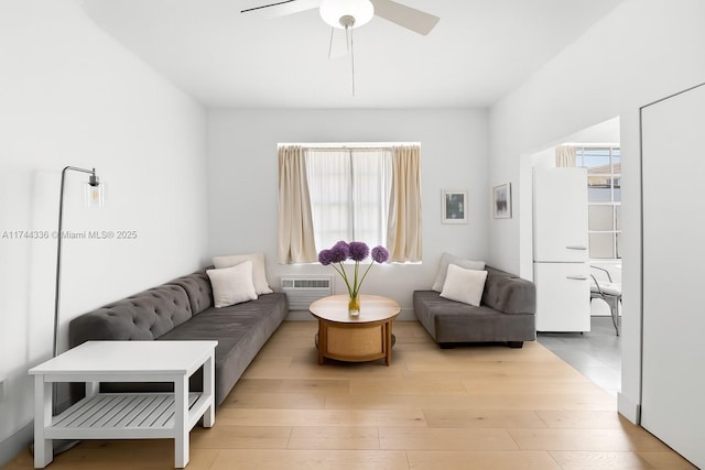 1005 Meridian Ave Unit 7, Miami Beach, FL 33139 - living room with healthy amount of natural light, a ceiling fan, and light wood finished floors