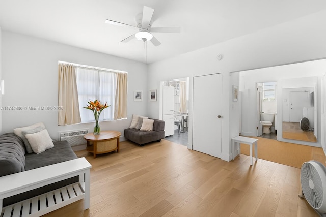 1005 Meridian Ave Unit 7, Miami Beach, FL 33139 - living area with light wood-style floors, a ceiling fan, and a wall mounted air conditioner