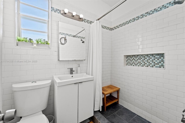 1005 Meridian Ave Unit 7, Miami Beach, FL 33139 - full bathroom with tile walls, vanity, and a tile shower