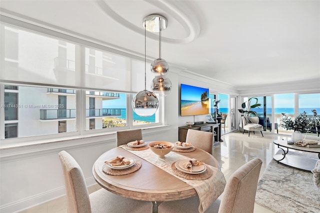 1012 N Ocean Blvd Unit 701, Pompano Beach, FL 33062 - dining area featuring crown molding