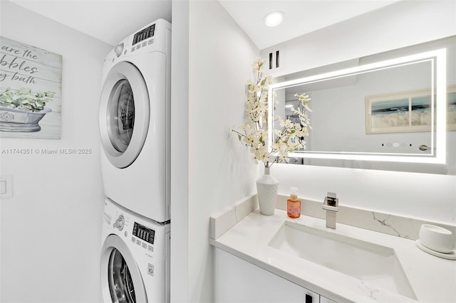 1012 N Ocean Blvd Unit 701, Pompano Beach, FL 33062 - laundry room featuring estacked washer and dryer