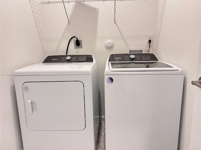 laundry area featuring separate washer and dryer