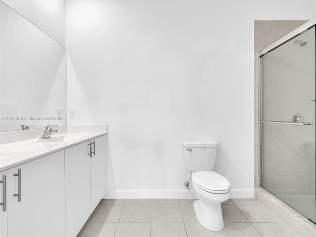 bathroom featuring toilet, an enclosed shower, and tile patterned flooring