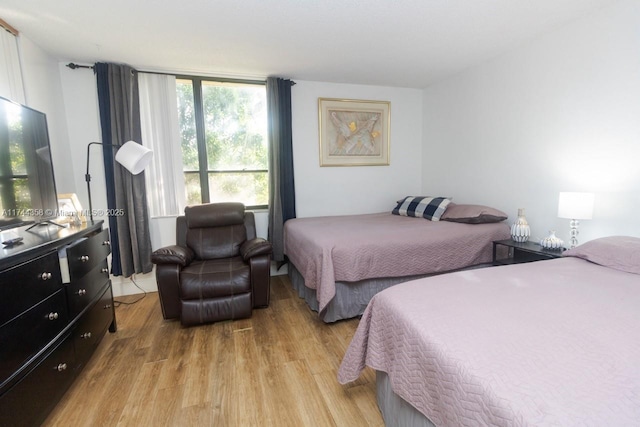 bedroom featuring light hardwood / wood-style floors