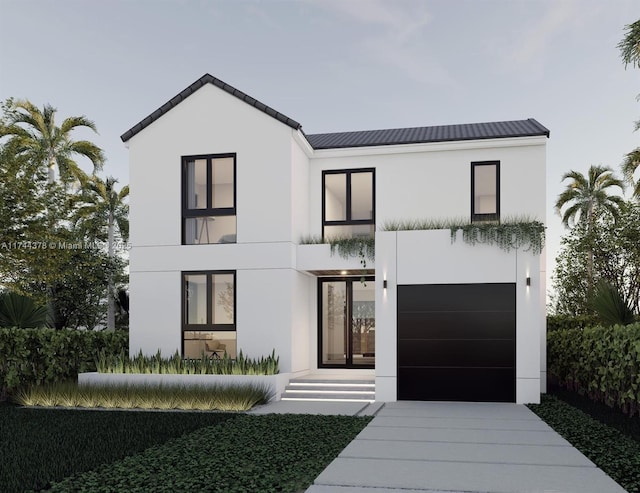 modern farmhouse with stucco siding, concrete driveway, and a garage