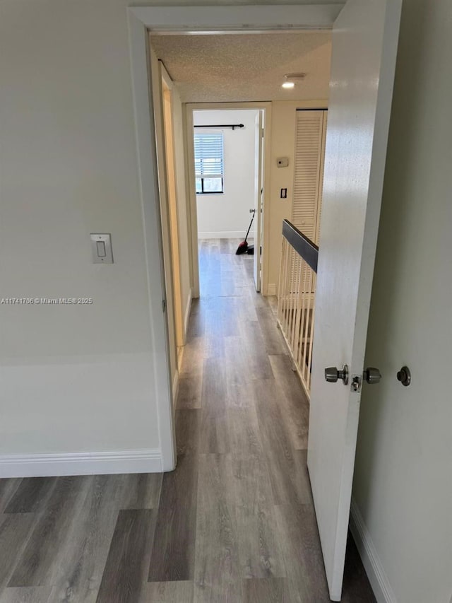 10800 NW 7th St Unit 3B, Miami, FL 33172 - hall with wood finished floors and baseboards