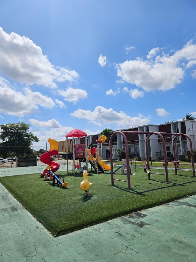 10800 NW 7th St Unit 3B, Miami, FL 33172 - community play area featuring a lawn