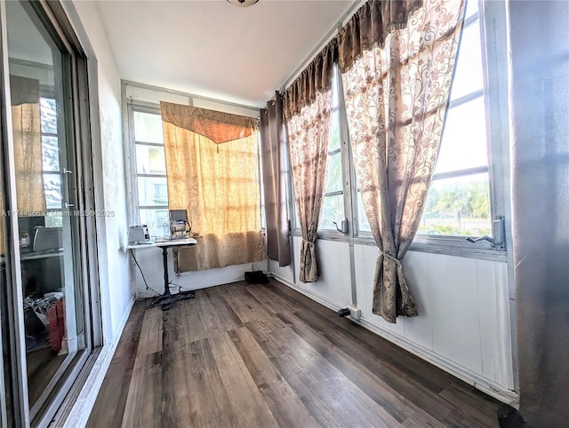 interior space with dark hardwood / wood-style flooring